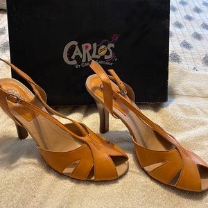 Excellent condition, NWOT , never used .  Unique style.  Light melon leather